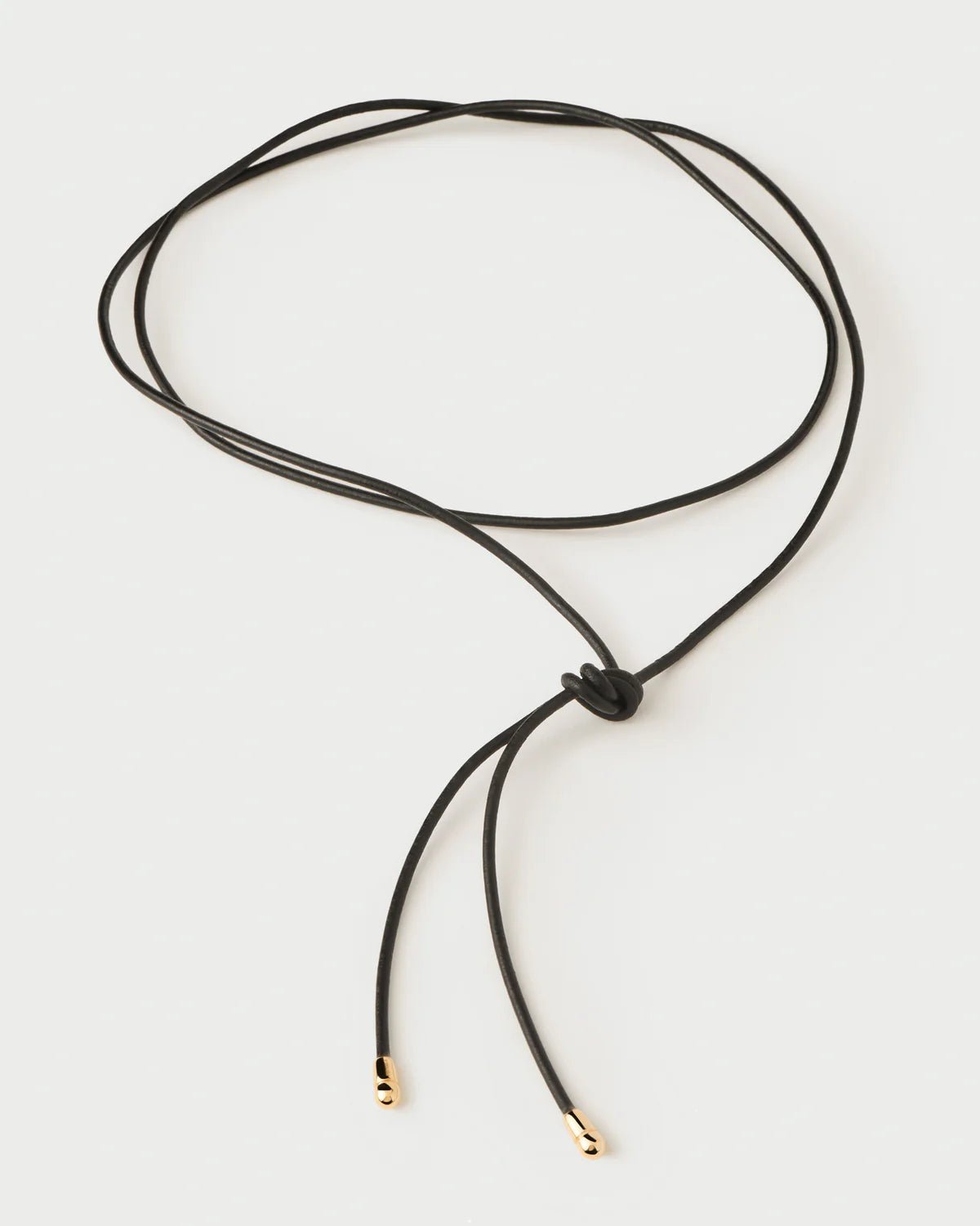 Collar lazo de cuero Dana — Cuero negro con baño de oro 18K — ROUCLÊ Maison Contemporaine