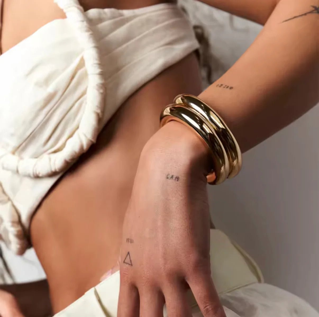 Trinity Bangles — Set de 3 aros dorados de acero — ROUCLÊ Maison Contemporaine